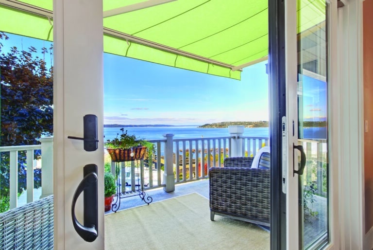 balcony with lime retractable awning