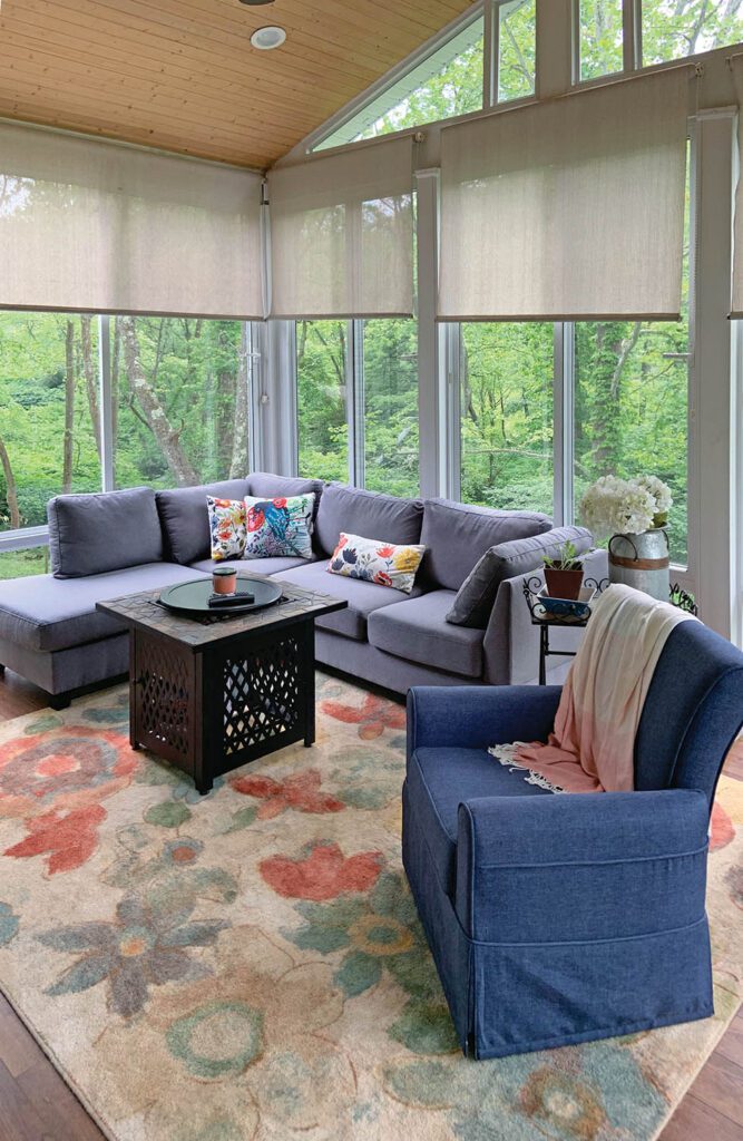sunroom with comfortable seating for entertaining | Ways to Use A Sunroom