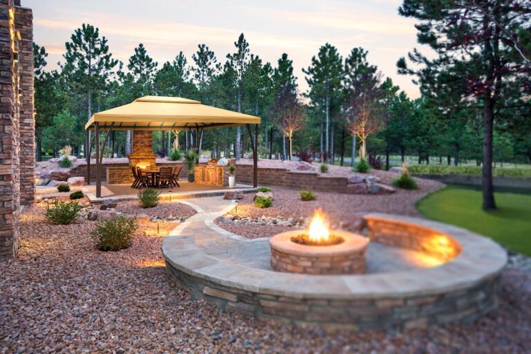 Open Air Cabana covers outdoor dining and kitchen in beautiful rock garden