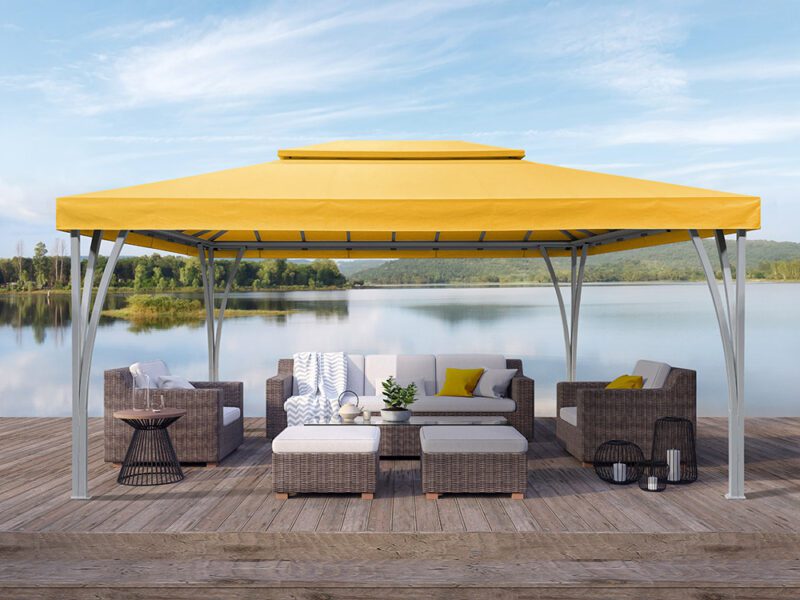 Outdoor cabana terrace living area with beautiful lake and mountain view