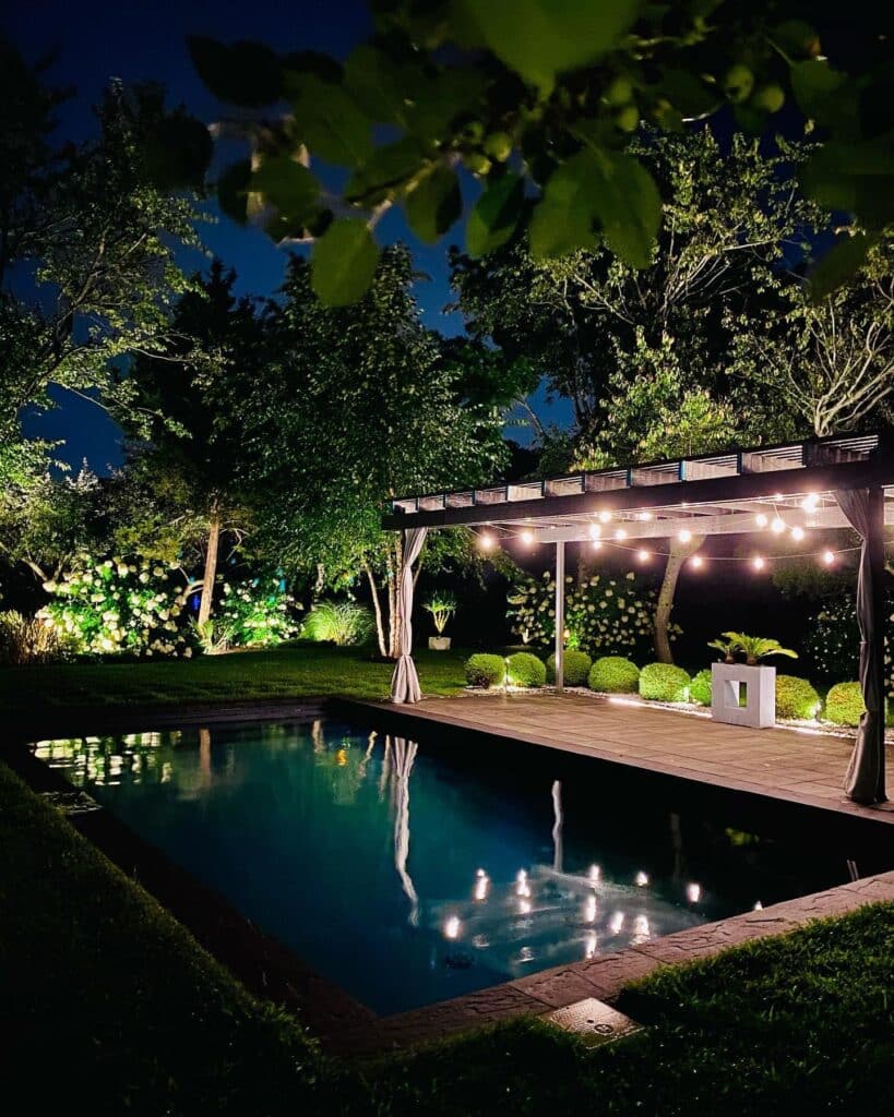 louvered roof pergola at night