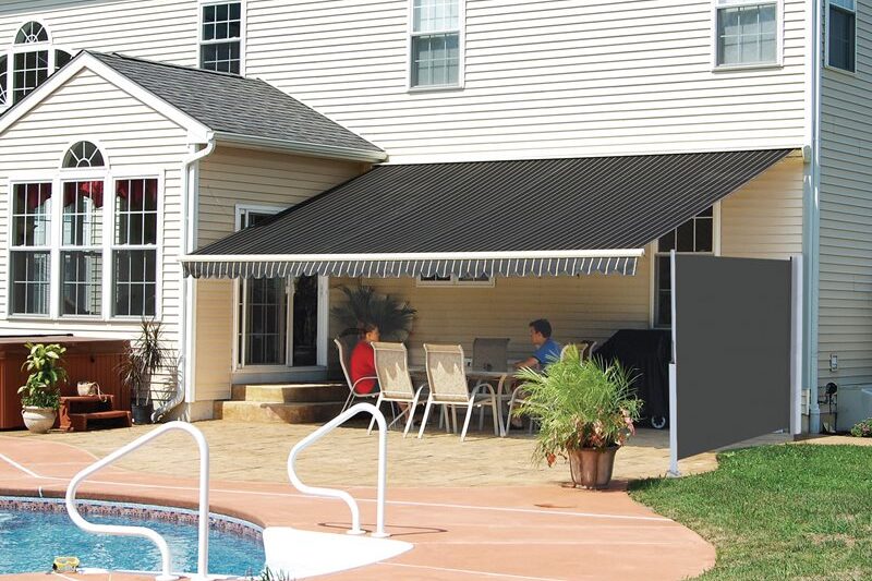 Combining a horizontal shade with an awning creates a shady outdoor oasis, even on the sunniest days.
