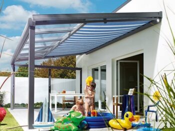 Tension Shade mounted under glass roof.