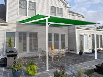This wall-mounted tension shade structure creates comfortable shade for outdoor relaxation.