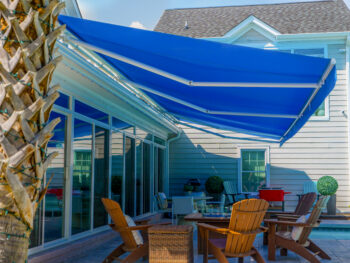 Large blue motorized awning side view